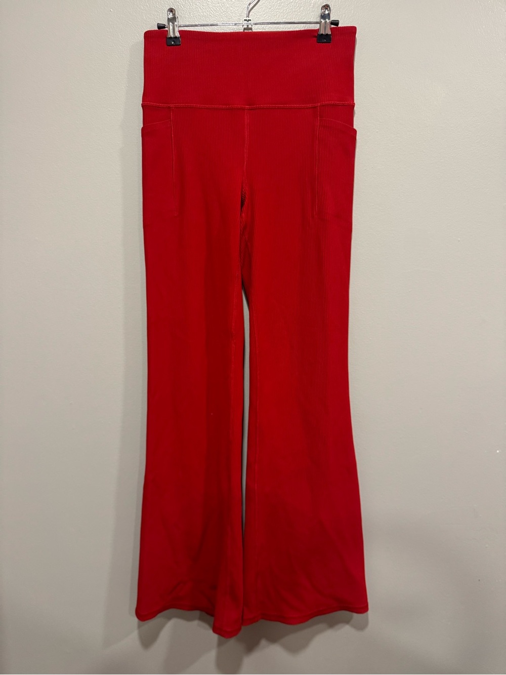 Athleta Salutation Stash Rib Flared Legging in Candy Red Size Medium
